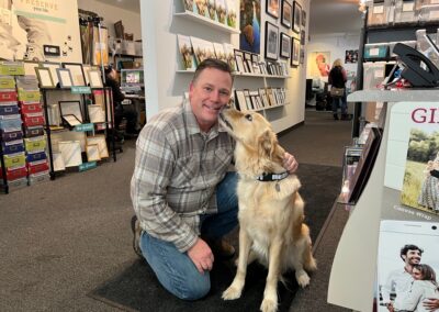 A shop dog greeting customers inside an IPI member's retail store